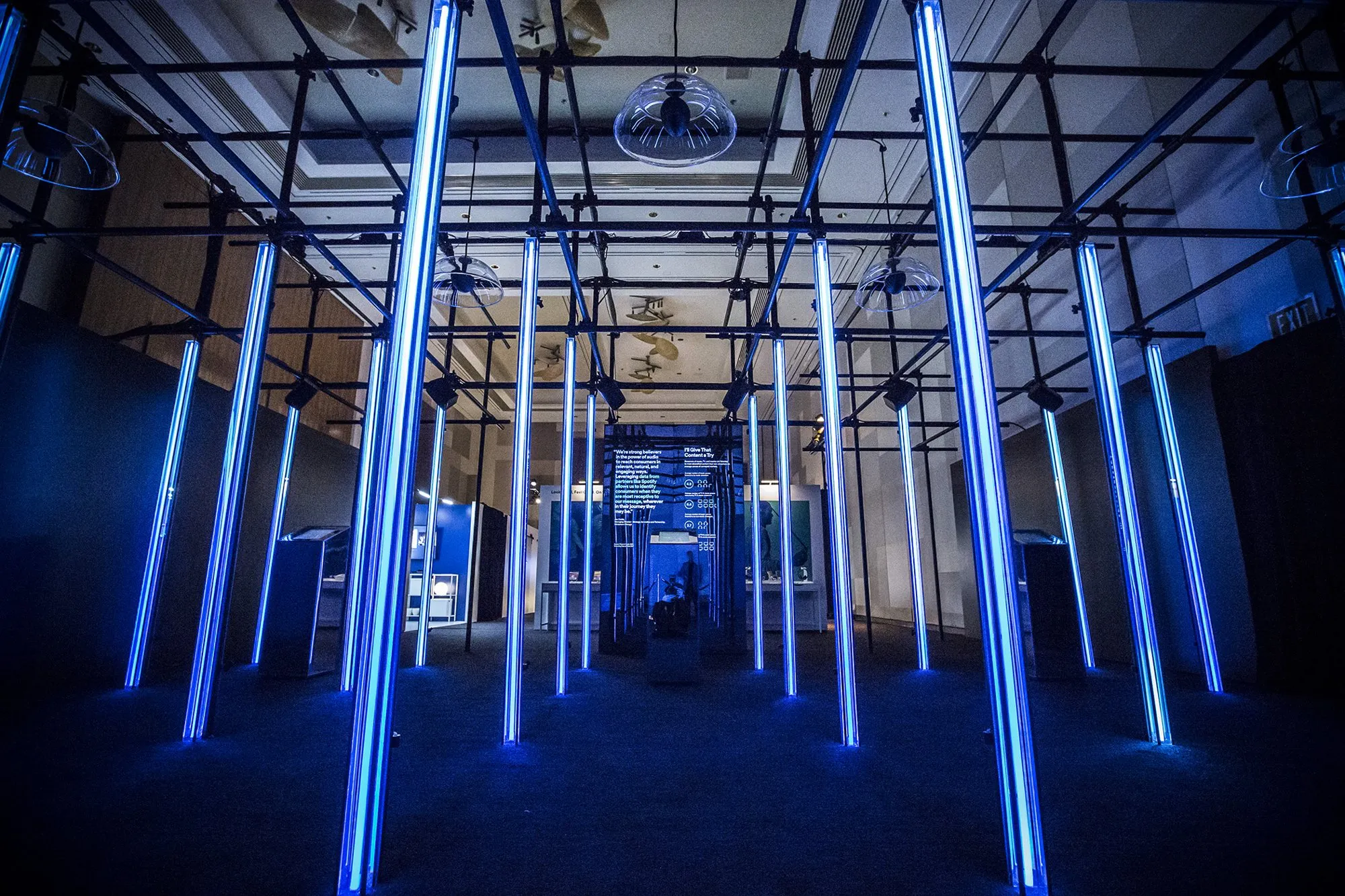 A tunnel of vertical blue LED tubes inside Spotify's CES 2017 booth
